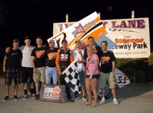 Whitesell in victory lane with family friends